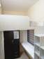 Loft Bed Type With Big Window And Cabinet With 2 Sharing Bathrooms Dubai UAE